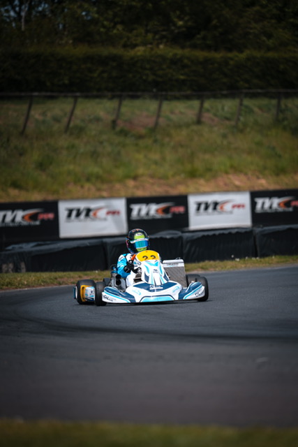 On track past TVK signage — PFI
